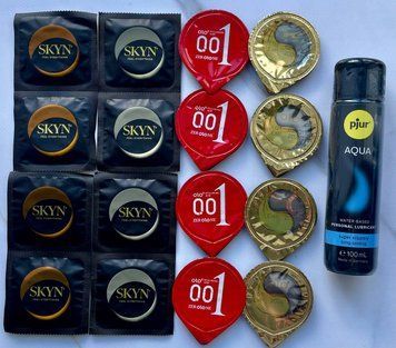 Набір з 16 штук Olo, Skyn + лубрикант pjur Aqua (100 мл) SOS4034 фото