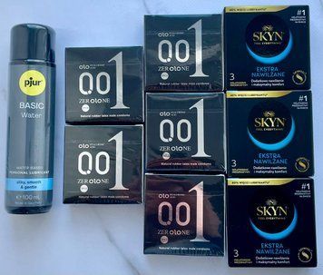 Набір 24 шт OLO Feeling Ultrathin 001 + Skyn Extra Lube + Лубрикант pjur Basic Waterbased, 100 мл SOS3790 фото